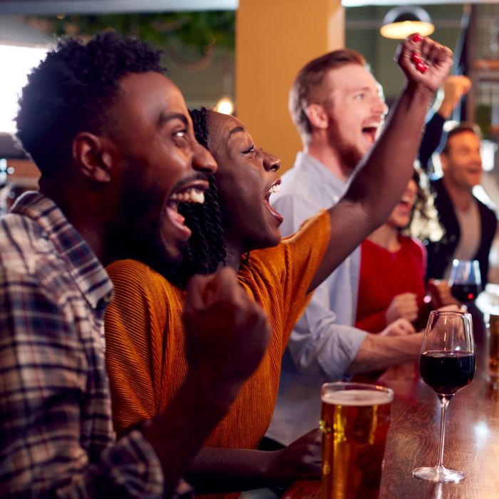 People watching women's euros at the bar